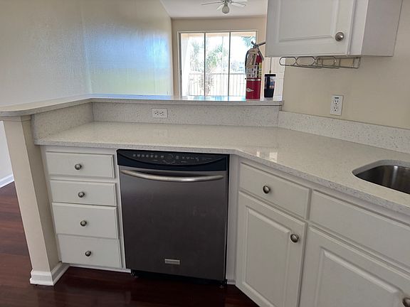 Kitchen with Granite and Dishwasher, Oven,Microwave, and Refrigerator