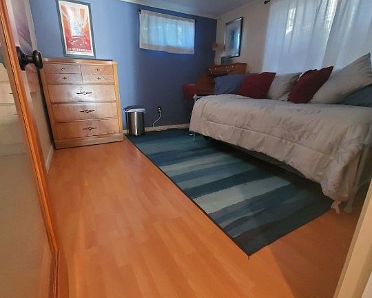 Bedroom 2 (can accommodate up to full bed). Note that room no longer contains bed.