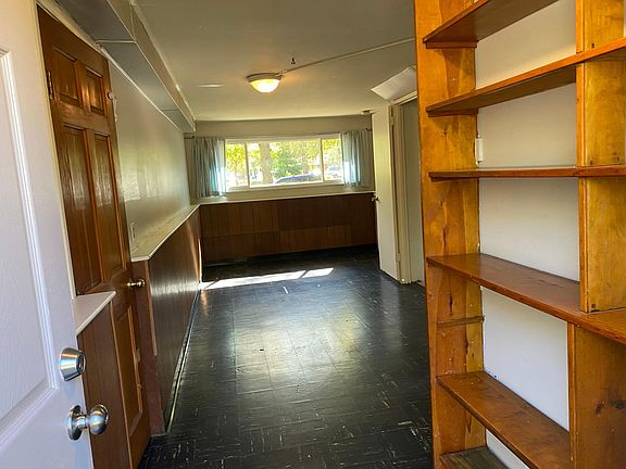 Family Room with bookshelves.