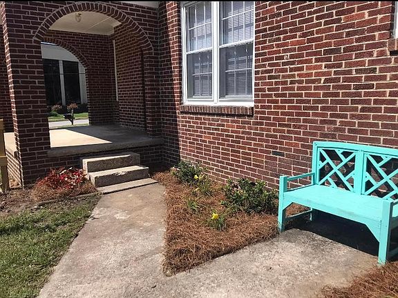 Covered porch and side yard