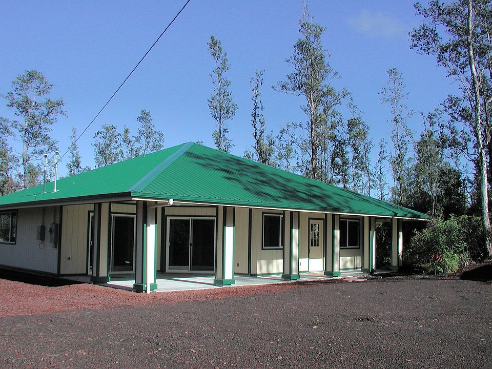 Thie home is features a front patio with two sliding doors.