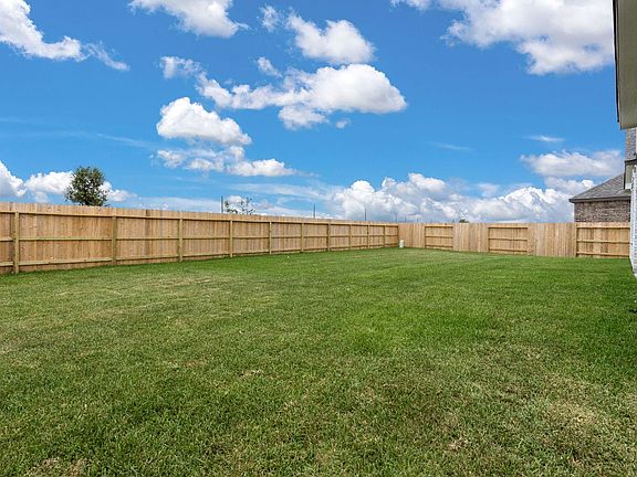 Come and see this spacious backyard with plenty of space for the kids to play.
