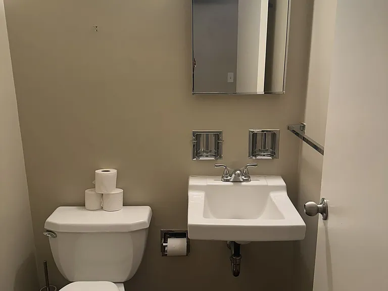 Half bath, located at entryway.