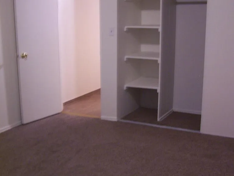 large bedroom with storage
