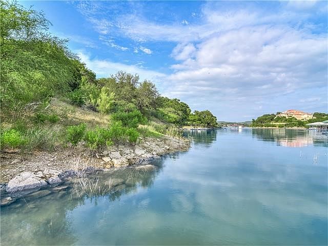 Lot slopes gently to the water, (no cliff drop off), for easy access.