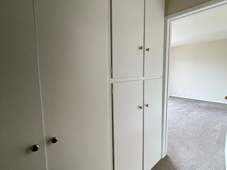 Cabinets at the top of the stairs