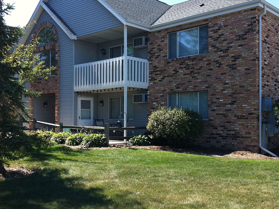 Upper unit on East side of building