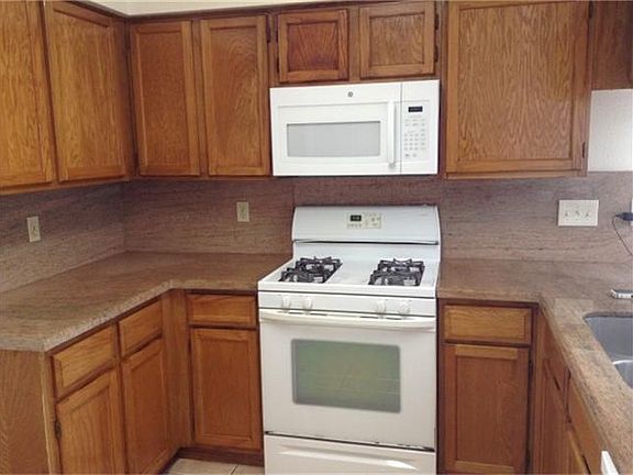 Nice bright kitchen with new microwave.