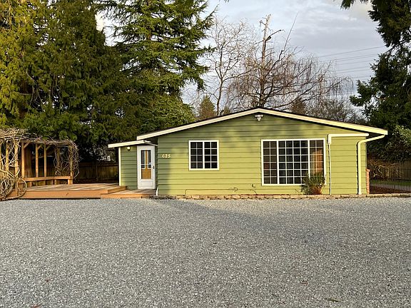 920 Sq Ft home with deck and partially fenced yard