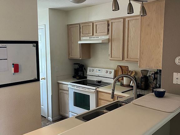 Kitchen with large pantry and breakfast bar