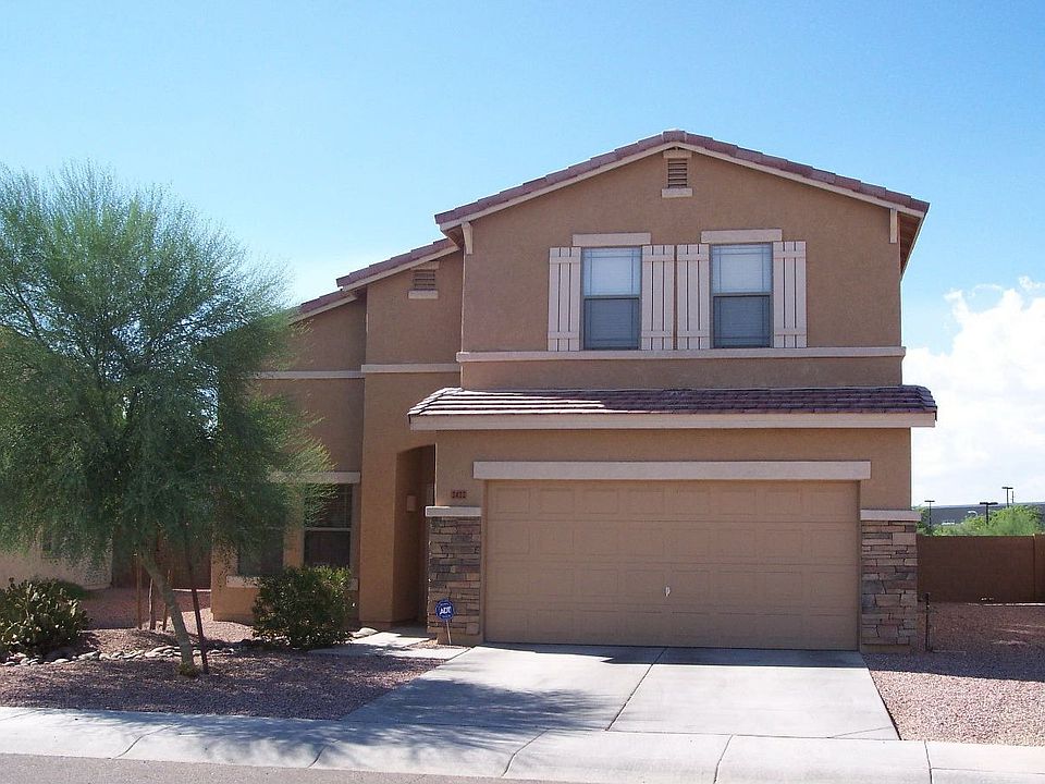 Front of home. Huge lot on a curve gives a giant, usable back yard.