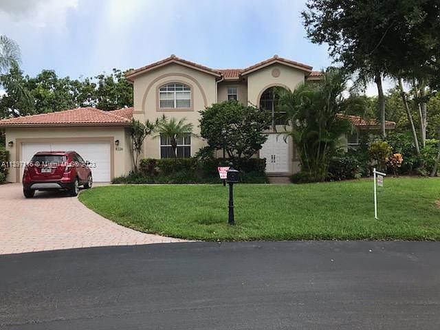GATED COMMUNITY! NEWER BUILT in 1999! Rare to find a quality newer home that is available for RENT! All tile floors downstairs and new Laminate Wood Floors upstairs! ALL IMPACT GLASS WINDOWS UPSTAIRS and on the Front of the house and complete shutter syst