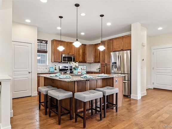 4th image of 8623 E 55th Avenue
