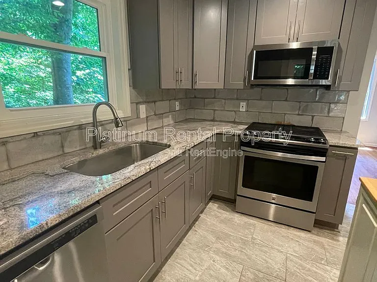4186 Nowata Dr NE — Photo 27