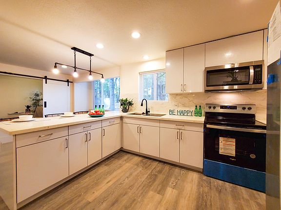 Large open kitchen with bar perfect for entertaining