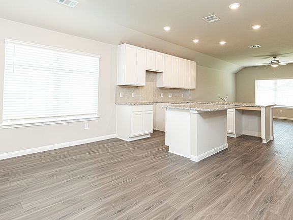 Dining Area to Kitchen and Family Room