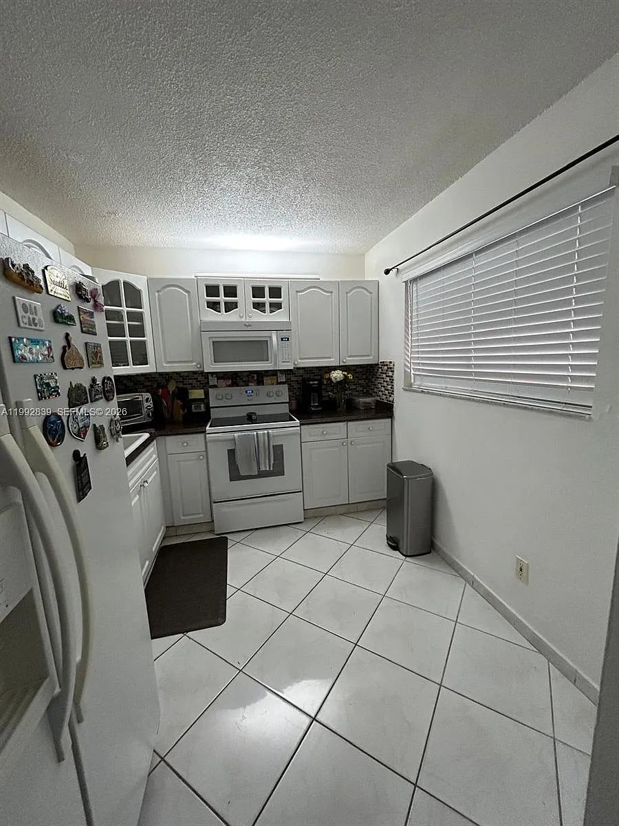 Building Photo - 17000 NW 67th Ave #123