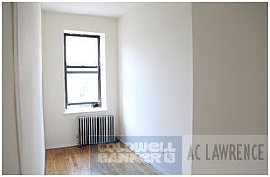 5th image of 209 E 10th St APT 15