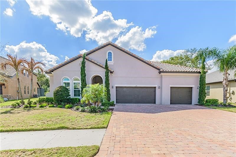 Let you rose-brick paved driveway welcome you home!! :-)