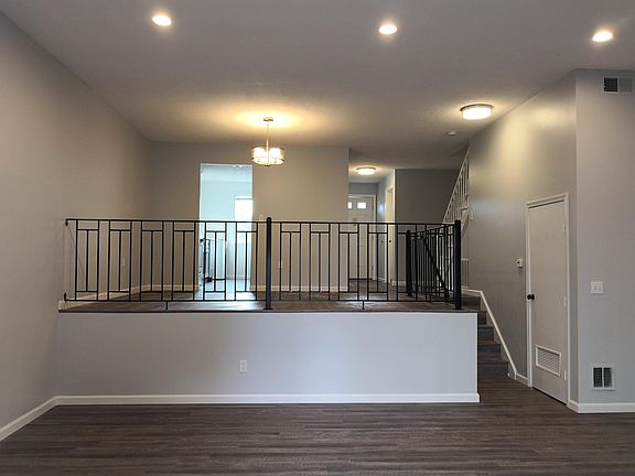 Large living room with new flooring and LED lighting