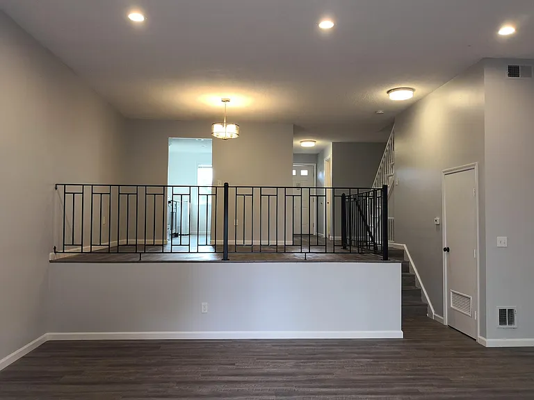 Large living room with new flooring and LED lighting