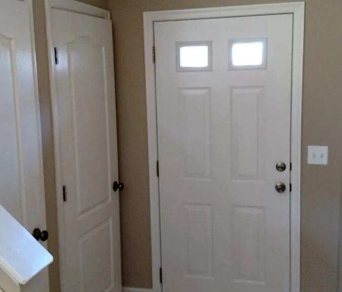 front door with closets