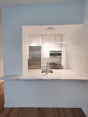 5th image of 457 W 43rd St APT 4F
