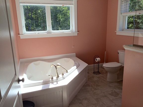 Jacuzzi tub in master bedroom