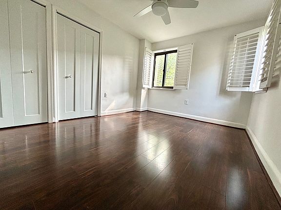 Bedroom with private view, two windows and two closets.