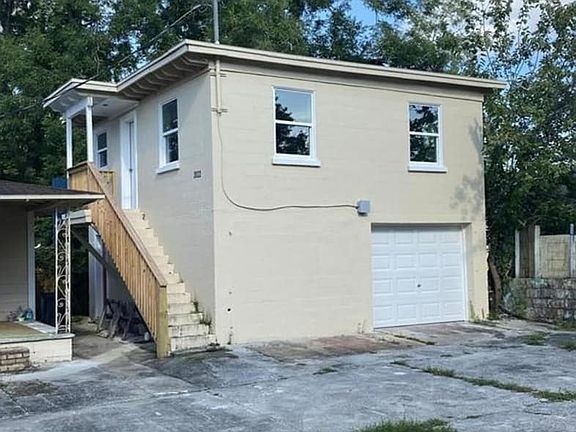 Upper level home with a private garage and plenty of storage.