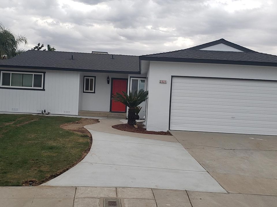 Front view of residence A. There is a second home on parcel (residence B) with separate PG&E meter connections, fence and parking area.
