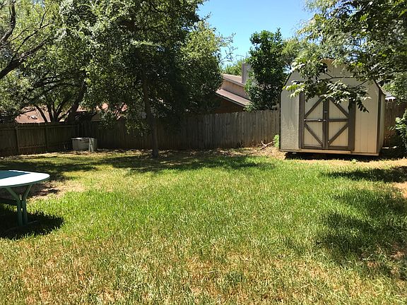 Storage shed for tools and lawn mower