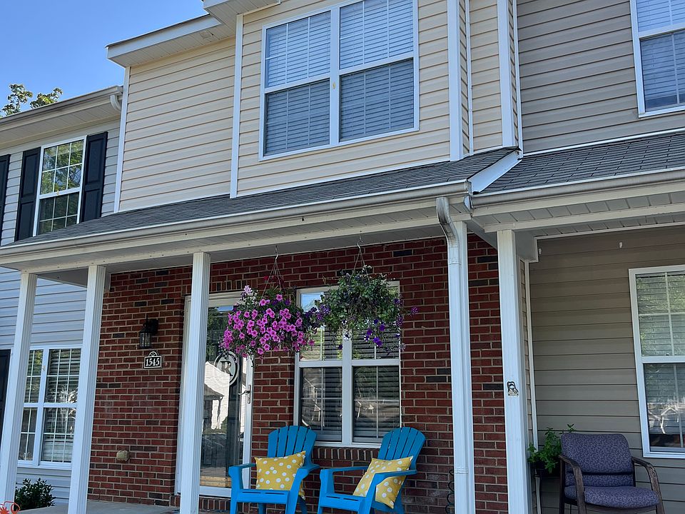 No porch furniture or flowers included.