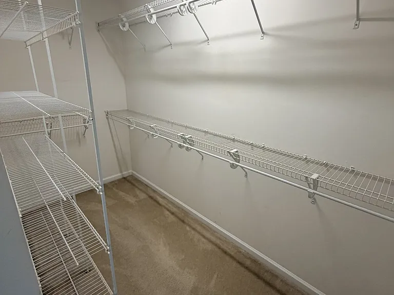 Attached to Master bedroom-Large walk-in closet with organization system