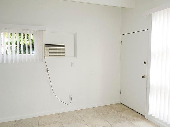 Living Room; AC is not working and will be removed.