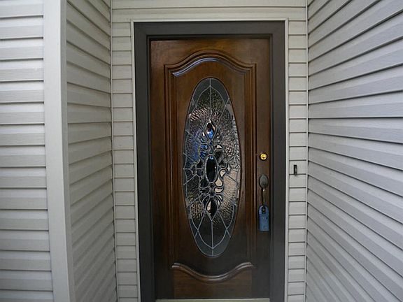 Front Door That Is Upgraded Lead Glass.