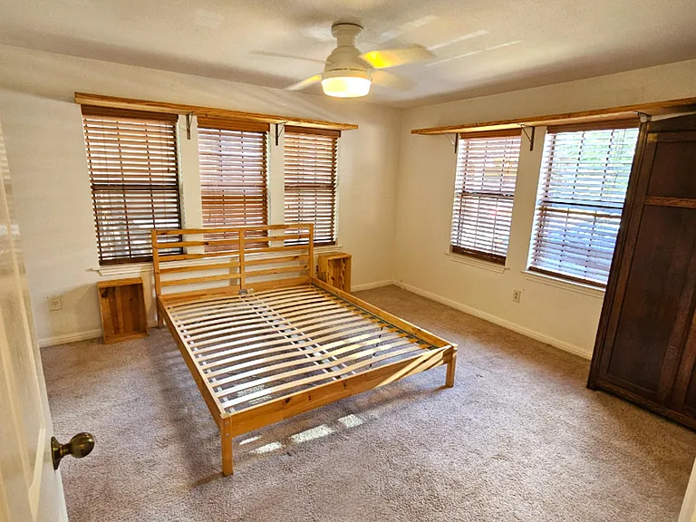 Master Entry - with queen bed frame and armoire