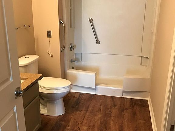 Updated bathroom with walk in shower and updated fixtures