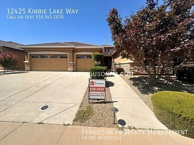 Gorgeous Three Bedroom Home with a Den and Large Backyard — Photo 1