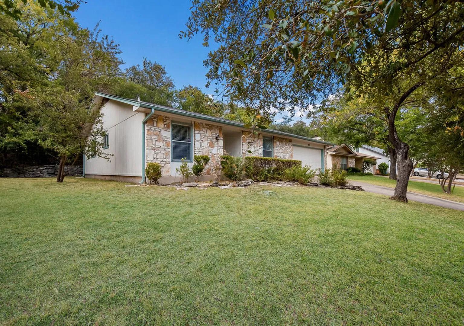 North Austin Gem with Wooded Backyard & Two-Car Garage! — Photo 4