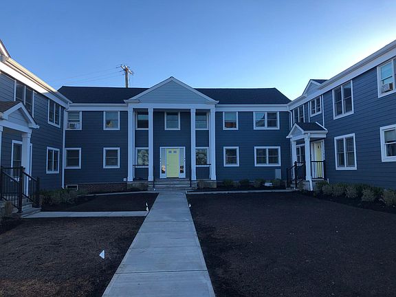 Building entrance, which looks straight out to Deal Lake