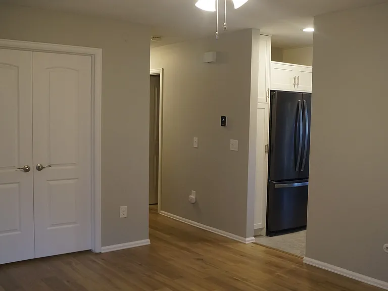 Livingroom view to den and kitchen.