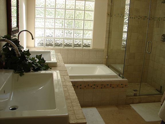 Master bath with jetted tub and tons of cabinet space