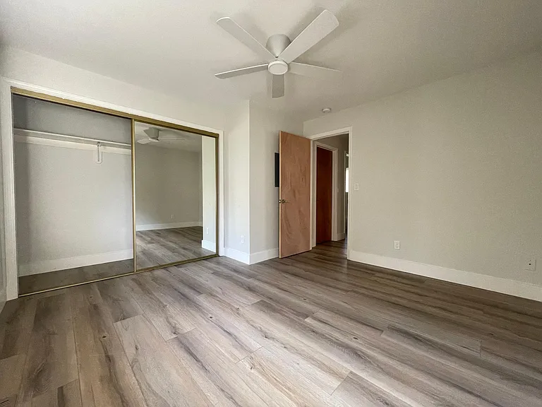 Unit 413 has refinished hardwood flooring rather than LVT like this unit 417
