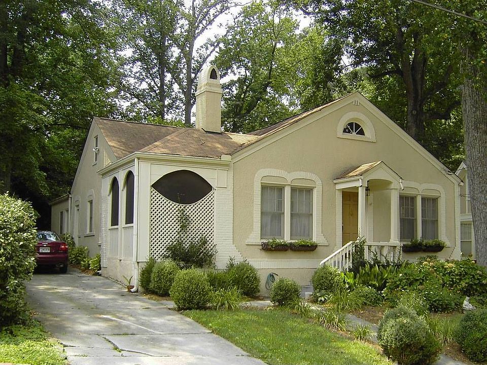 Wonderfully Landscaped Yard both Front and Back.  Window Boxes stay with Home.