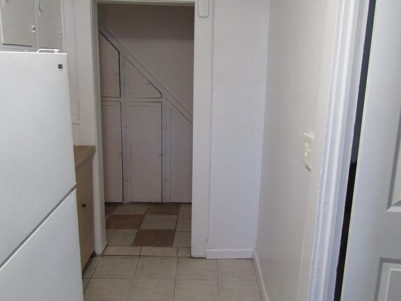 kitchen looking at hallway, door on the right goes into living room