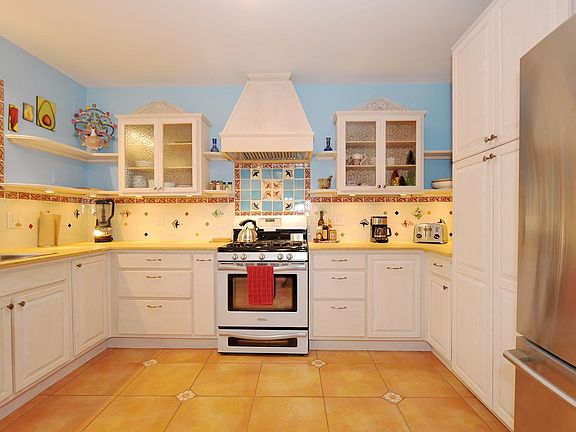 Gas stove, fridge/freezer, dishwasher, microwave, toaster, coffee maker, all dishes, pots/pans etc