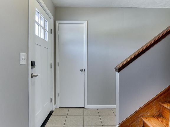 Front entry with coat closet opens to the center of home. .
