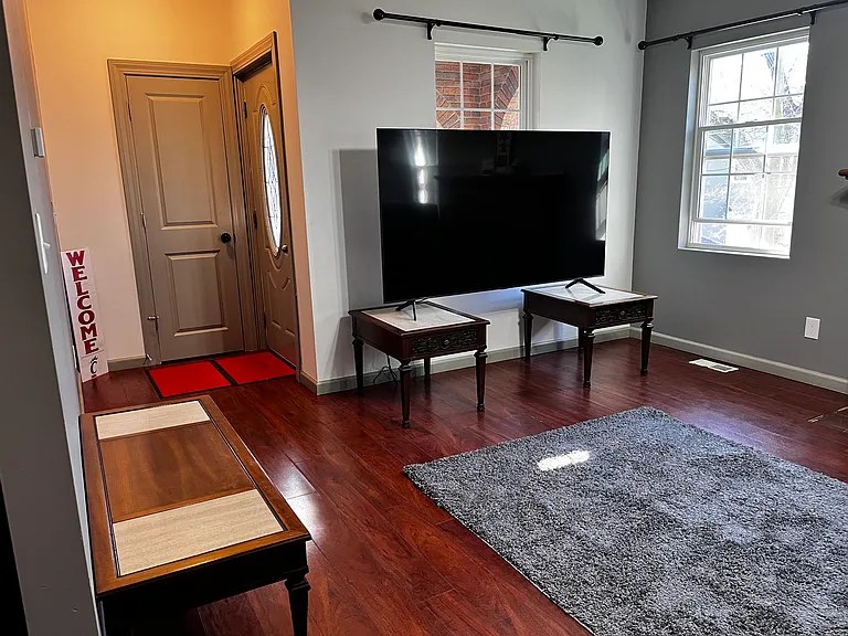 Living room with 75" smart TV