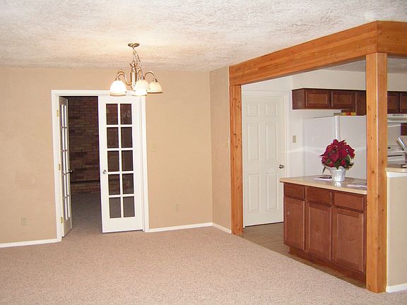 Dinning room and door to second Living area with fireplace